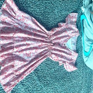 I am selling a butterfly stretchy cowgirl dress